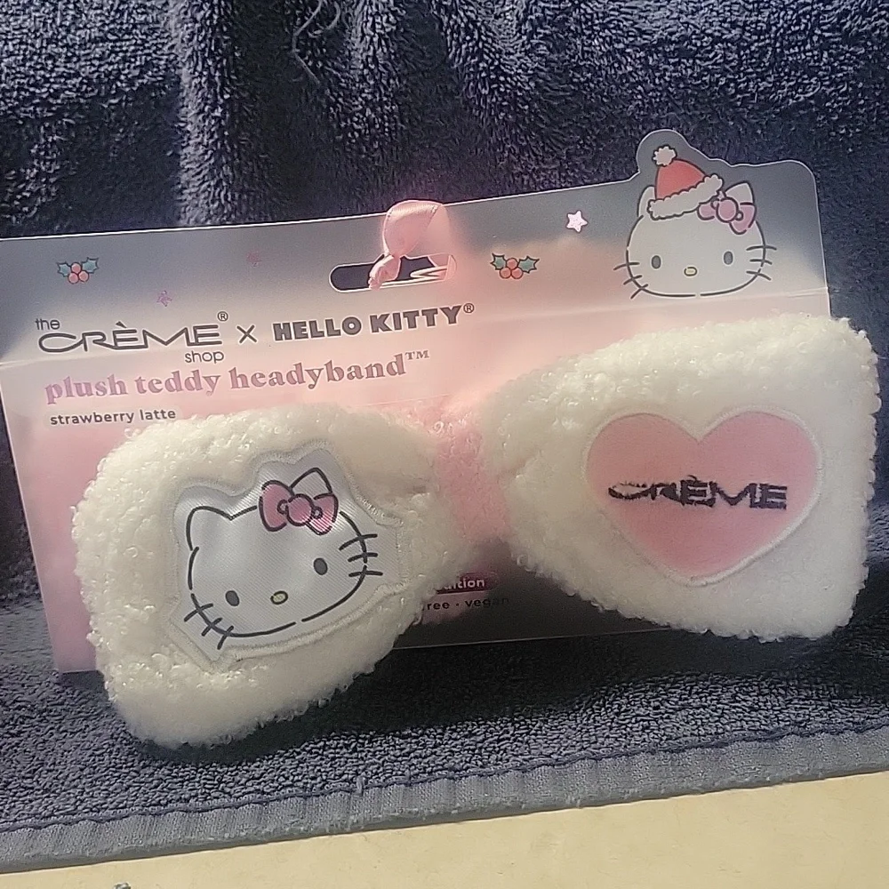 Hello Kitty Pink Plush Slippers and Headband Set. Skippers are size 7/8.